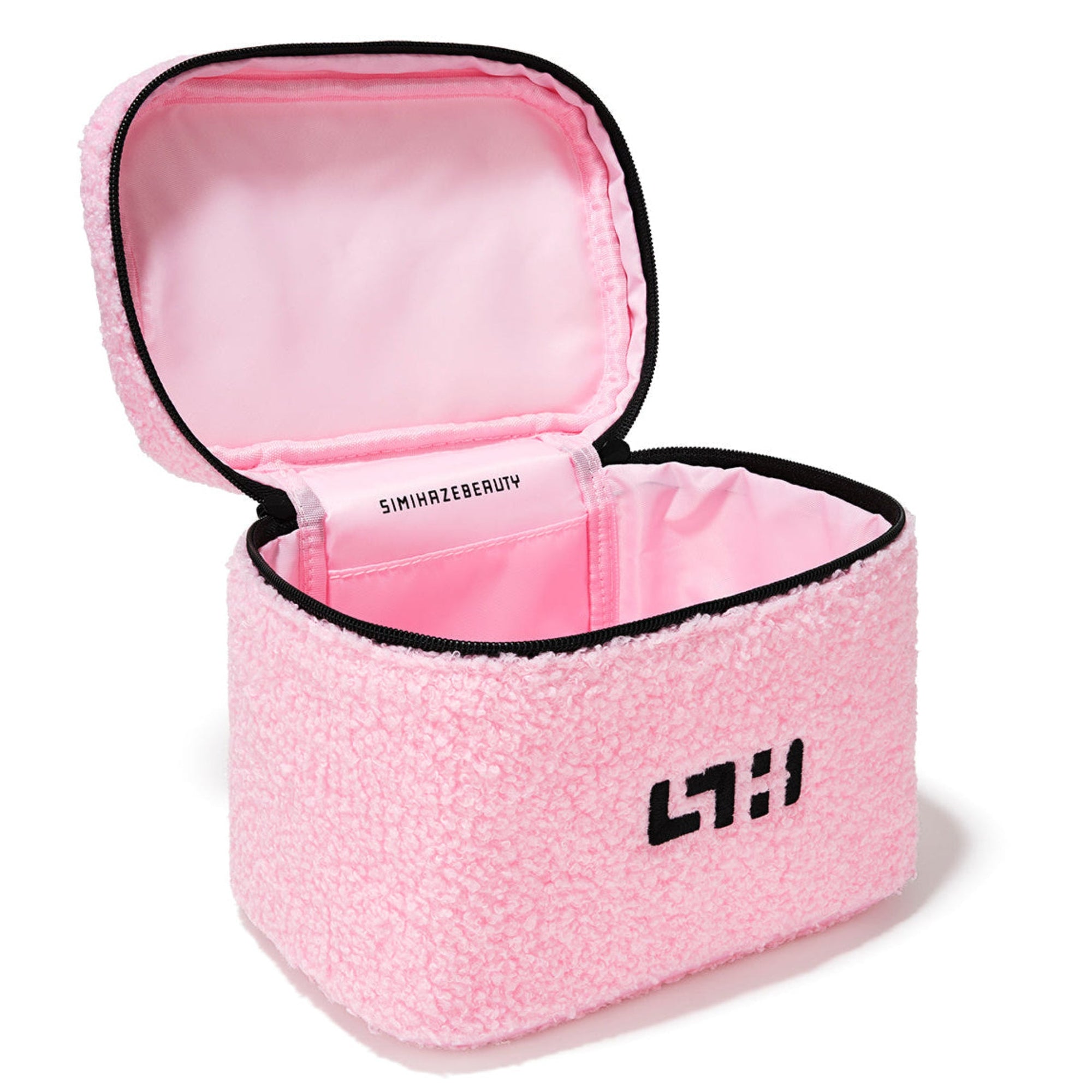 Pink textured makeup bag open